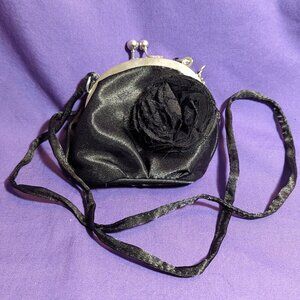 Shoulder bag with rosette detailing